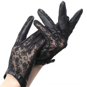 Black genuine leather lace gloves with floral embroidery and leather wrist bow, close-up flat lay showcasing delicate lace details