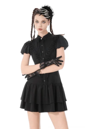 Black lace ruffled gothic dress with puff sleeves and decorative front bow, front full view on model with braided hair, showcasing layered ruffle skirt and lace gloves