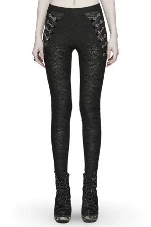 Black lace skull gothic leggings with ornate metal waist buckles, front view on model, featuring intricate embossed lace texture