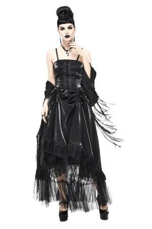 Black gothic slip dress front view with spaghetti straps and tulle hem, worn by alternative model on white studio background