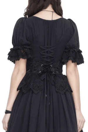 Back view of black gothic lace underbust corset featuring lace-up back closure and scalloped lace hem trim