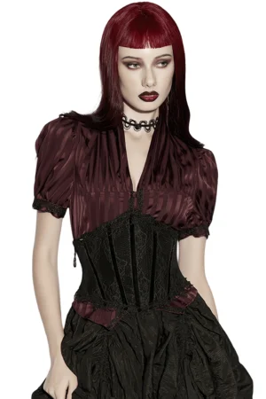 Black lace underbust corset worn by model with crimson bob hairstyle, front full-body view showcasing scalloped lace trim and boning structure