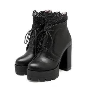 Black lace-up gothic platform ankle boots with square heel, front paired view showing decorative lace collar and chunky block heel