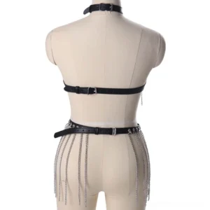 Black leather body harness back view showing adjustable buckles and waist chain details on mannequin