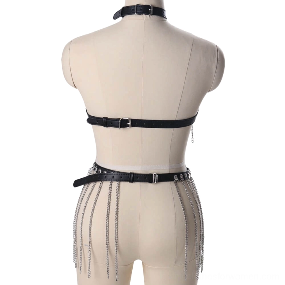 Black leather body harness back view showing adjustable buckles and waist chain details on mannequin