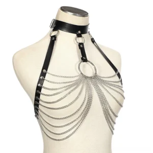 Gothic body jewelry chest harness displayed on mannequin with black leather straps and multi-layered silver chains
