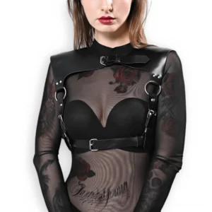 Black leather chest harness with silver D-ring hardware, front view on tattooed model with adjustable buckle closures