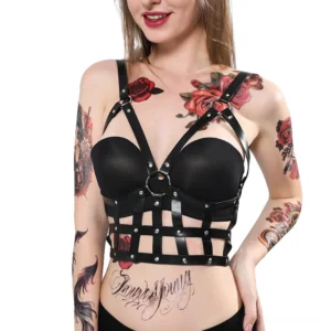 Black PU leather chest body harness front view on model with adjustable crisscross straps and metal O-ring detail