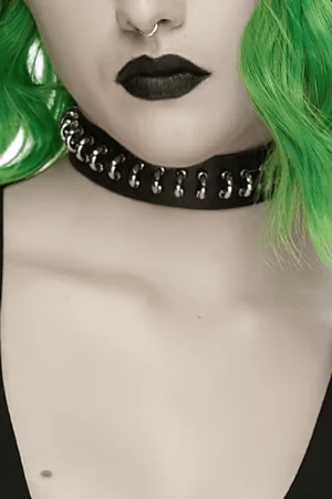 Industrial gothic choker with metal ring trim detail, worn on model showing nose ring and dark makeup