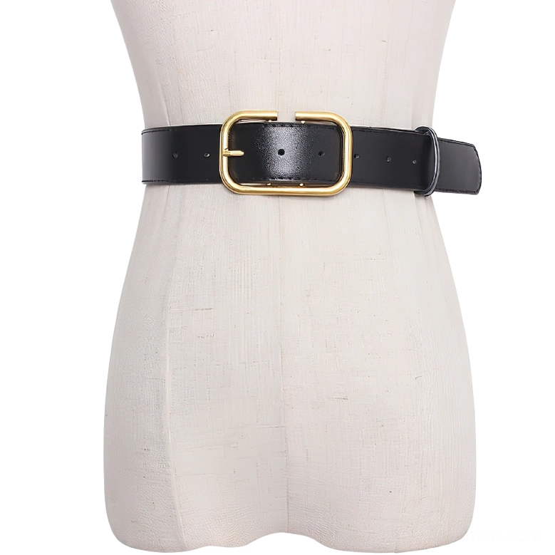 Black narrow leather corset belt flat lay close-up on mannequin torso with gold rectangular buckle detail