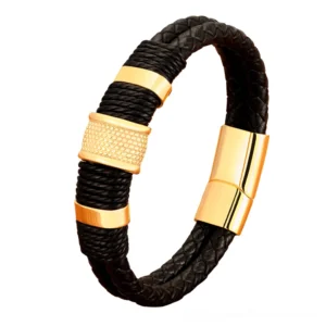 Black leather dual-layer gothic bracelet with gold-plated stainless steel accents and decorative hardware, front oblique angle