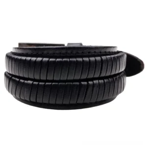 Black wide genuine leather gothic cuff bracelet flat lay top view with double-layered ribbed design and metal buckle closure