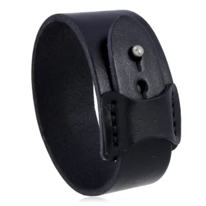 Black genuine leather gothic cuff bracelet with metal stud closure, adjustable punk style wristband front view