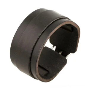 Black leather gothic double-wide cuff bracelet with copper alloy toggle clasp, front 3/4 angle view showcasing matte leather finish and architectural layered design