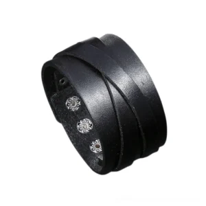 Black wide leather gothic wrap bracelet with multi-layer straps and metal snap closures, oblique view