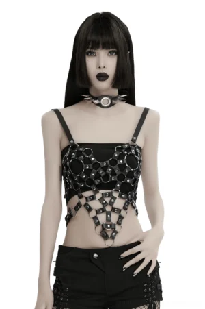 Black leather heart harness crop top front view on model, geometric cutout grid design with metal rings