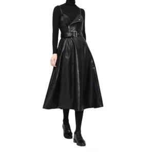 Black PU leather spaghetti strap midi dress front view with adjustable waist belt, styled with turtleneck top and leather shoes