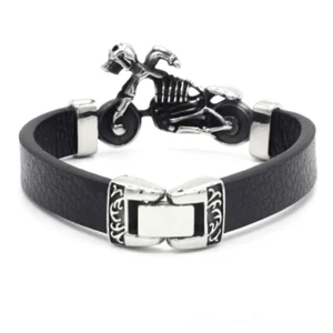 Motor skull leather biker bracelet showing flat push clasp closure and detailed metal fastening mechanism, top-front angle view
