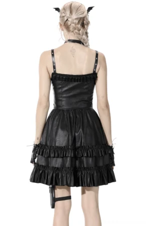 Back view of black leather ruffled slip dress showing tiered ruffle hem and thin straps