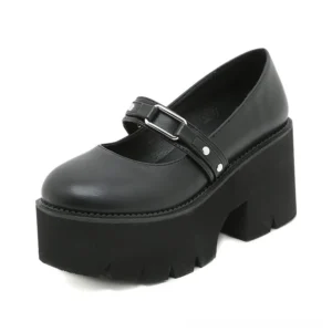 Single black Mary Jane shoe side profile displaying chunky block heel, substantial platform, and adjustable buckle strap detail