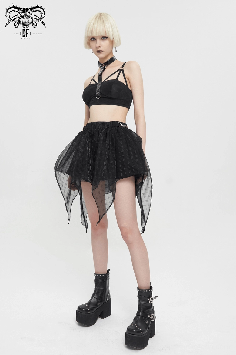 Front three-quarter angle of complete gothic grunge outfit featuring black mesh skirt, crop top, and platform boots on model