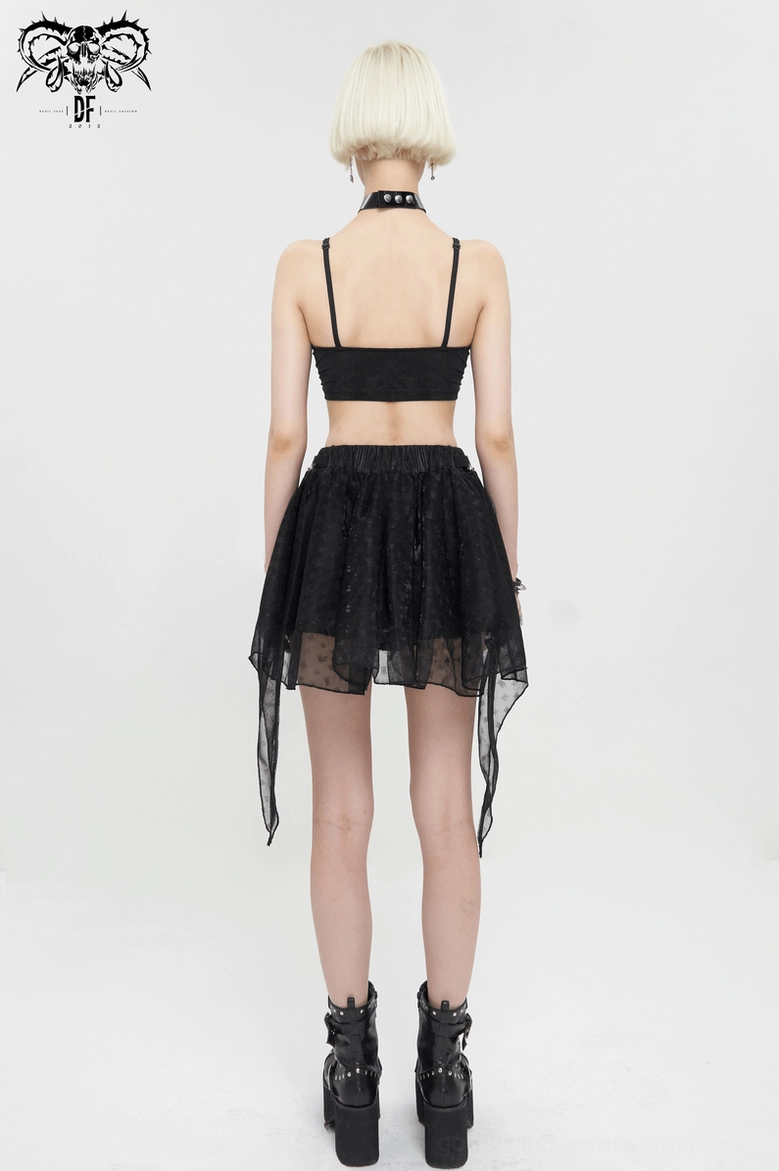 Detailed close-up view of black mesh gothic skirt showing polka dot texture, irregular hem points, and fabric quality