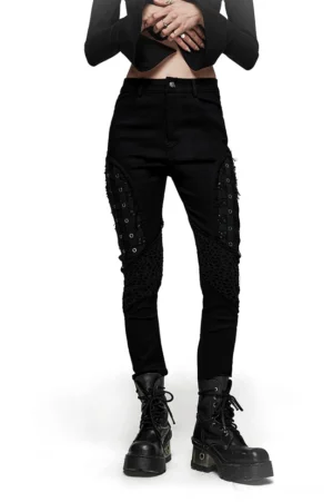 Black mesh grommet gothic skinny pants front view on model - industrial cage design with high waist