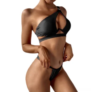 Black one-shoulder push-up bikini set with asymmetrical cutout design, front view on model