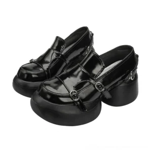 Black patent leather platform loafers with dual silver buckles – gothic punk dress shoes front three-quarter view