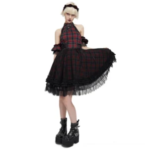 Black plaid gothic dress with detachable cold shoulder sleeves and ruffled lace hemline, front three-quarter view on model
