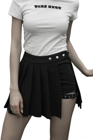 Asymmetrical black plaid gothic mini skirt front view on model, showing buckle strap and pleated detail