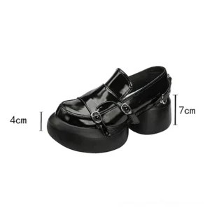 Black glossy patent leather platform loafer with silver buckle straps and chunky block heel – side profile with height measurement