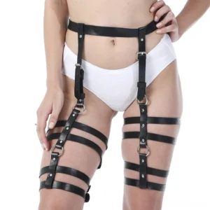 Black PU leather leg harness front view with adjustable metal D-rings and buckles on white model