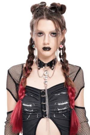 Black skull chain gothic choker with faux leather collar and silver tassel, front view on model with gothic styling