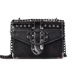 Black gothic studded square shoulder bag with skull rivets, ornate hasp lock, and metal chain strap - front view