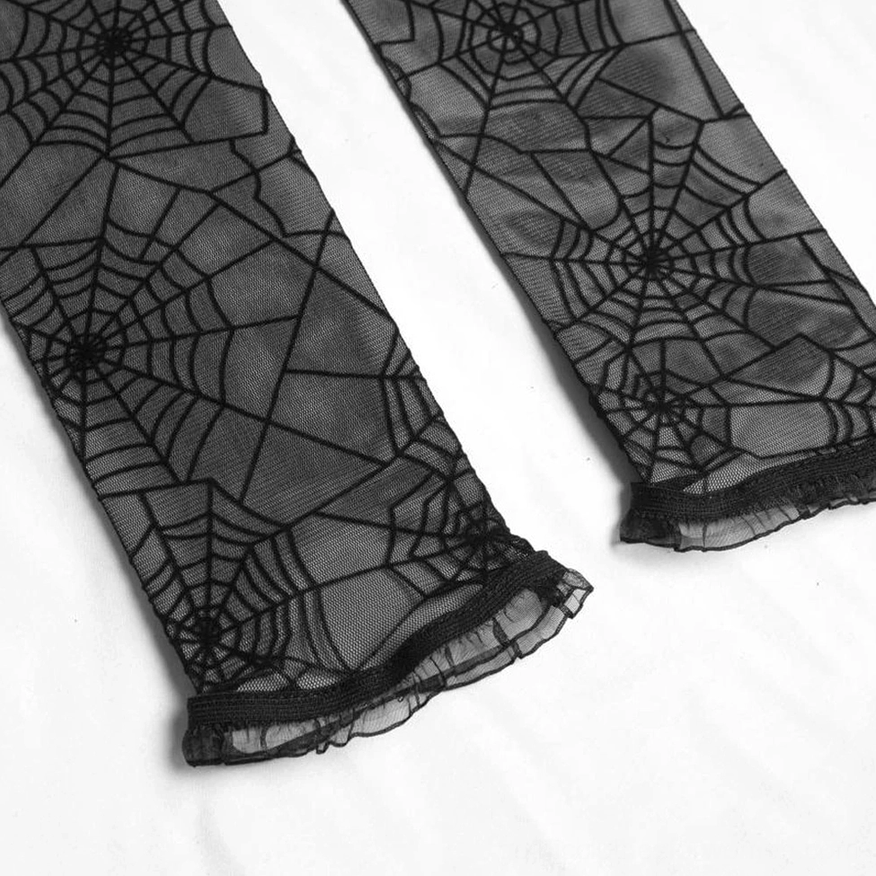Pair of black spider web fingerless gloves flat lay close-up showing ruffled cuff and mesh construction