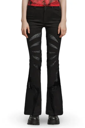 Black spiderweb flared gothic pants front view on model, mesh cutout details, skull button accent