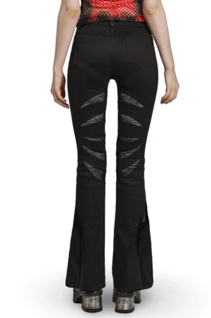 Black spiderweb gothic pants back view on model, rear mesh panels, flared hem silhouette