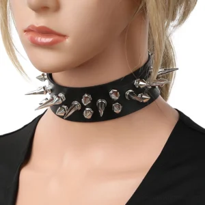 Black spiked PU leather gothic choker worn on mannequin, front view showing conical silver spikes and metal studs in dense pattern