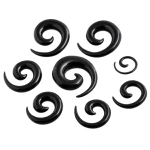 Black spiral acrylic ear tunnel plugs collection in multiple sizes arranged on white background, showcasing glossy finish and hypnotic spiral design for gothic ear stretching