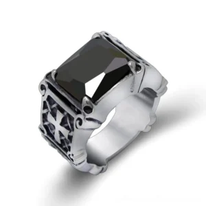 Black semi-precious stone celtic cross gothic ring, three-quarter side view showing maltese cross engravings