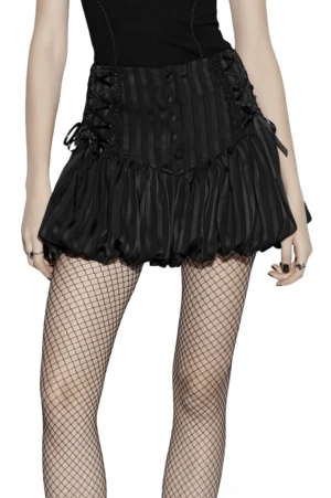 Gothic black striped bubble shorts with lace-up corset sides, side view on model with voluminous ruffled hem