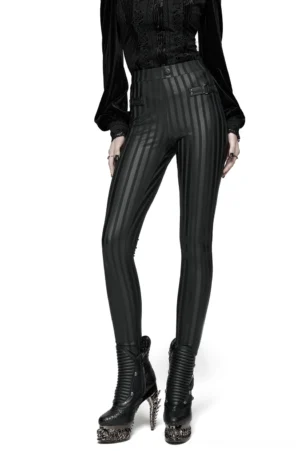 Black striped gothic leggings front view on model, styled with studded heeled boots - alternative fashion streetwear