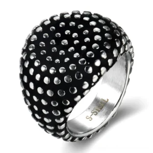 Black studded dome gothic ring - front view showing full coverage raised dot embossed texture on stainless steel with aged silver finish