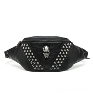 Black gothic studded waist bag with pyramid rivets and central skull ornament, flat lay front view