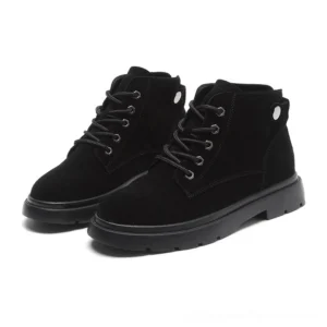 Black suede lace-up gothic platform ankle boots front three-quarter view with metal back detail