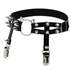 Close-up detail of black PU leather leg garter showing cone spikes, cat head O-ring, and hardware