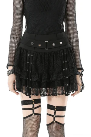 Black tiered lace gothic mini skirt with metal eyelets - front view on model