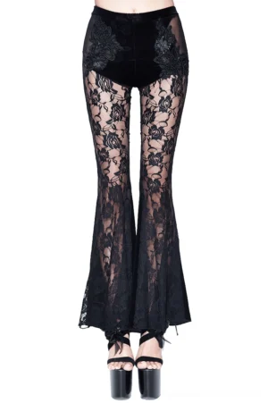 Black velvet flare pants with rose lace panels and embroidery, front view with platform heels
