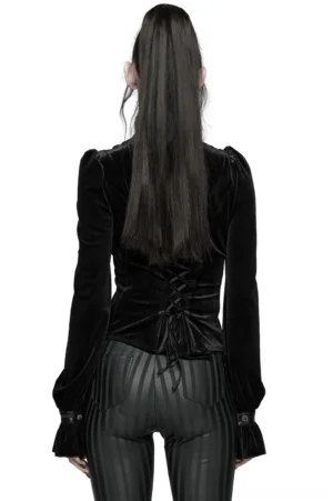 Black velvet gothic blouse back view on model - showing dramatic corset-style lace-up back closure and voluminous flared puffed sleeves